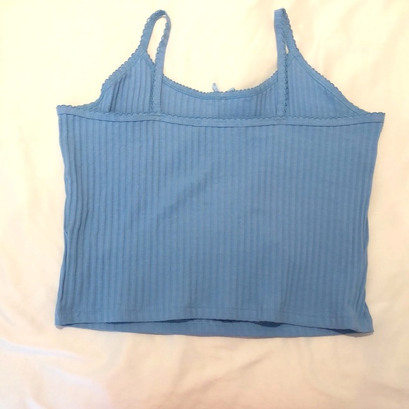 This is a light blue and is cropped tank top. This is from Housebrand! - Picture 2 of 3